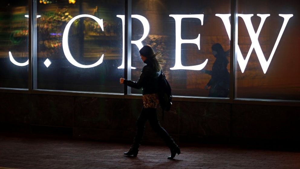 PHOTO: A woman walks past a J. Crew retail store in Baltimore, April 15, 2013.