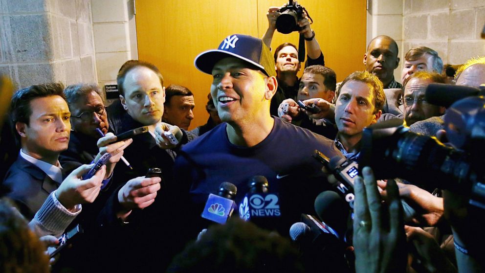 PHOTO: Alex Rodriguez of the New York Yankees answers questions outside the clubhouse before the game against the Boston Red Sox during Opening Day, April 1, 2013 at Yankee Stadium in the Bronx borough of New York City.