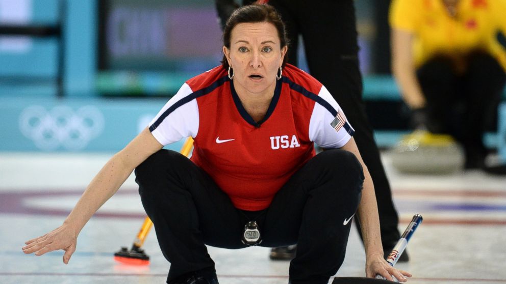 PHOTO: Ann Swisshelm reacts as she throws the stone during the womens curling round robin session 4 match against China at the Ice Cube curling centre in Sochi, Feb. 12, 2014.