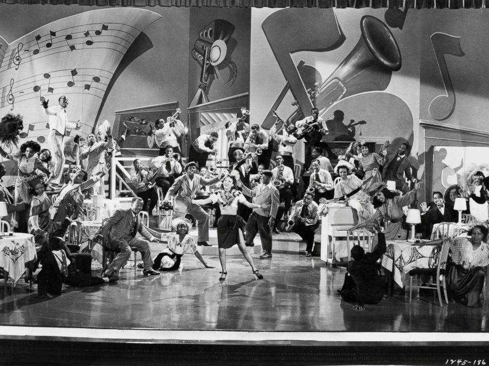PHOTO: Publicity still of Dorothy Dandridge, Buck and Bubbles and Louis Armstrong on stage in the film Atlantic City, 1944