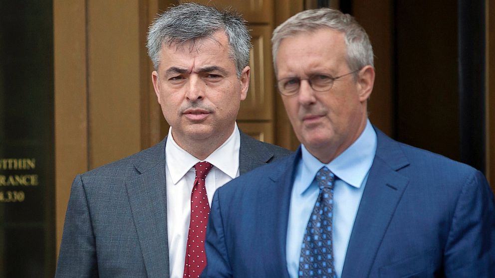 PHOTO: Eddy Cue, the Apple Inc. executive the government claims was the chief ringleader of a scheme to fix e-book prices, left, exits federal court in New York June 13, 2013.