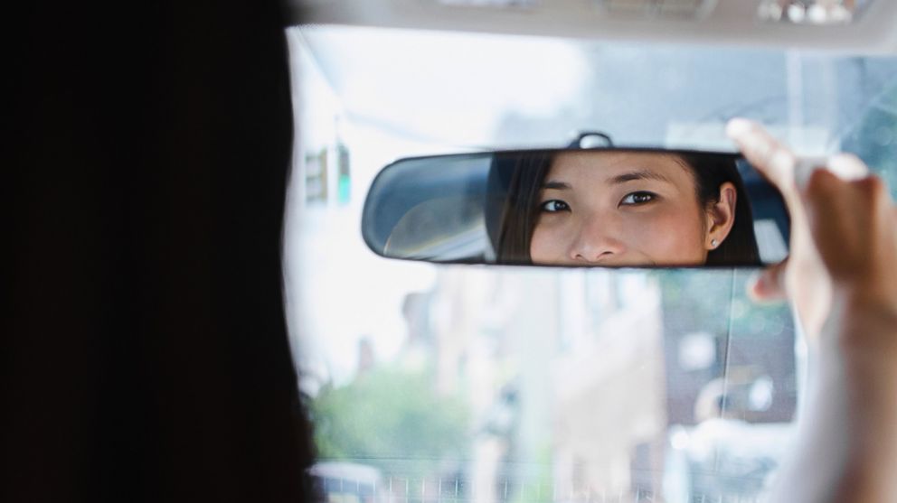 PHOTO: A rear-view mirror, paired with a backup camera, can help you back your car up safely.