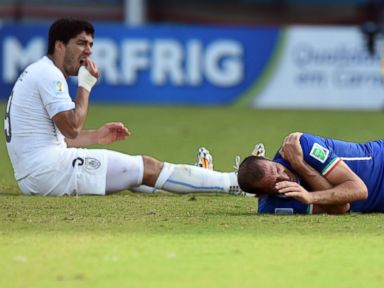 FIFA Suspends and Fines Suarez After Biting Player