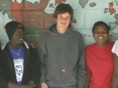 Picture of Tad Malone and African orphans.