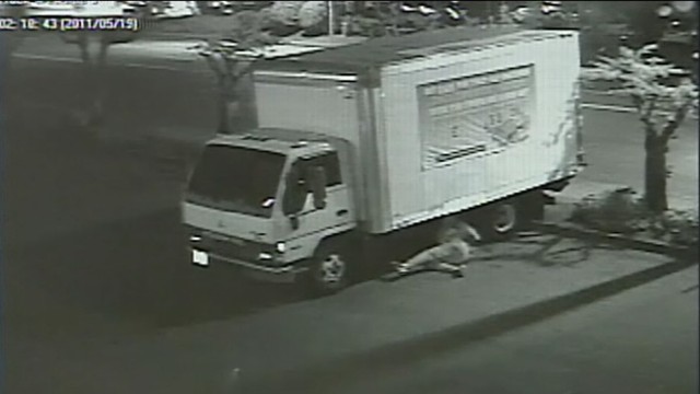 VIDEO: Security cameras film man cutting mattress stores delivery truck cables.
