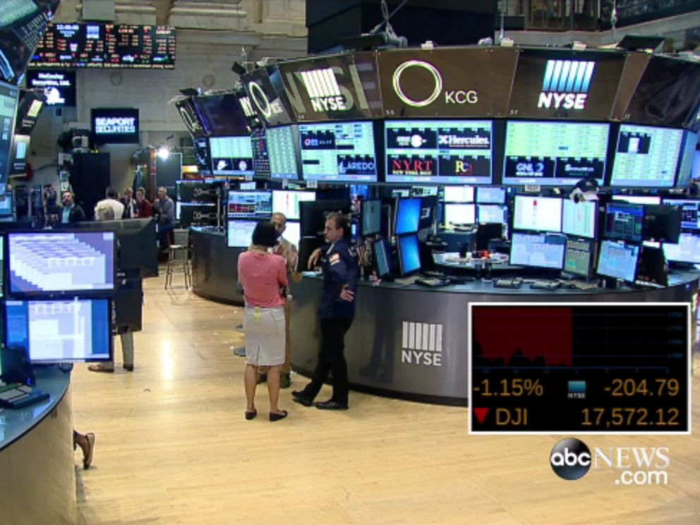 nyse trading halted; stocks down 1%