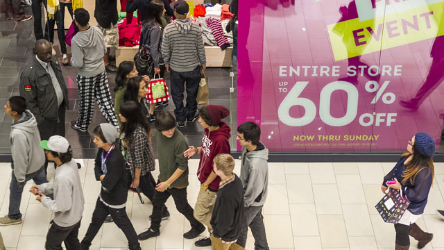 PHOTO: Young consumers shop early on the early morning hours at the GAP store offering a "Entire Store Up to 60% Discount" ad Friday, Nov. 23, 2012 at the Glendale Galleria mall in Glendale, Calif.