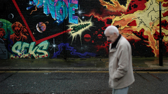 PHOTO: A man walks past street art in east London on Dec. 20, 2012 as the clock is ticking down to Dec. 21, the supposed end of the Mayan calendar, and from China to California to Mexico, thousands are getting ready for what they think is going to be a fa