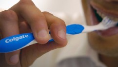 PHOTO: Man brushing teeth