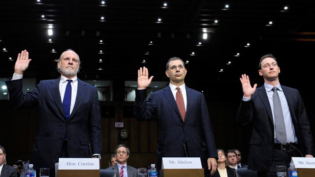 PHOTO: From left, Former MF Global Holdings Ltd. Chairman and CEO Jon Corzine, MF Global Holdings Ltd. President and COO Bradley Abelow, and MF Global Holdings Ltd. CFO Henri Steenkamp, are sworn in on Capitol Hill in Washington, Dec. 13, 2011, prior to