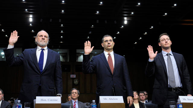 PHOTO: From left, Former MF Global Holdings Ltd. Chairman and CEO Jon Corzine, MF Global Holdings Ltd. President and COO Bradley Abelow, and MF Global Holdings Ltd. CFO Henri Steenkamp, are sworn in on Capitol Hill in Washington, Dec. 13, 2011, prior to