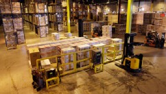 PHOTO: In this Nov. 16, 2012 photo, employees work at a shipping area of Generac Power Systems, Inc., one of the largest makers of residential generators in the U.S., in Whitewater, Wis.
