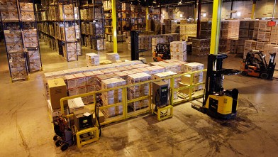 PHOTO: In this Nov. 16, 2012 photo, employees work at a shipping area of Generac Power Systems, Inc., one of the largest makers of residential generators in the U.S., in Whitewater, Wis.