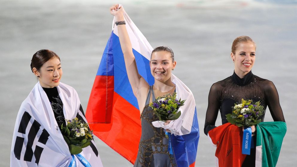 PHOTO: Adelina Sotnikova of Russia, center, Yuna Kim of South Korea, left, and Carolina Kostner of Italy celebrate after the womens free skate figure skating final at the 2014 Winter Olympics, Iceberg Skating Palace, Feb. 20, 2014, in Sochi, Russia.