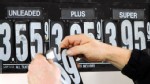 PHOTO: Gas station manager Fred Oliver, of Lisbon Falls, Maine, changes the price of gasoline on the pumps at a station in Topsham, Maine, Feb. 7, 2012. Gas prices are expected to rise as high as four dollars by Spring.