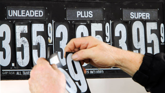 PHOTO: Gas station manager Fred Oliver, of Lisbon Falls, Maine, changes the price of gasoline on the pumps at a station in Topsham, Maine, Feb. 7, 2012. Gas prices are expected to rise as high as four dollars by Spring.