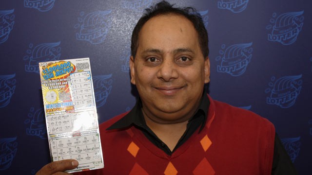 PHOTO: This undated photo provided by the Illinois Lottery shows Urooj Khan, 46, of Chicago's West Rogers Park neighborhood, posing with a winning lottery ticket.