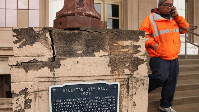 PHOTO: In this Feb. 29, 2012 photo, a Stockton city worker walks away from city hall in Stockton, Calif.