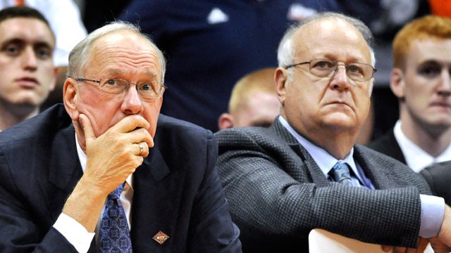 PHOTO: In this, Nov. 14, 2011, photo, Syracuse basketball coach Jim Boeheim, left, watches the action with Bernie Fine, an assistant coach, during a college basketball game. Shortly afterward, Syracuse placed Fine on administrative leave.