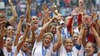 PHOTO: The United States Womens National Team celebrates with the trophy after they beat Japan in the FIFA Womens World Cup soccer championship in Vancouver, Canada, July 5, 2015. 