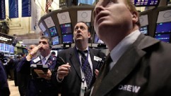 PHOTO: Traders work on the floor of the New York Stock Exchange, Nov. 21, 2011.