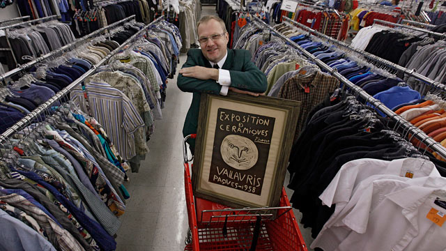 PHOTO: Zach Bodish poses with a signed Picasso print that he purchased for $14 in the Clintonville Volunteers of America store in Columbus, Ohio in this Mar. 27, 2012 file photo.