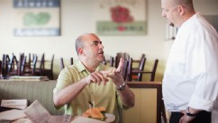 PHOTO: Angry customer complains to the chef in a restaurant.