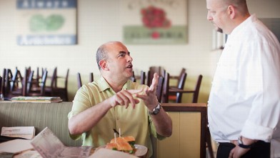 PHOTO: Angry customer complains to the chef in a restaurant.