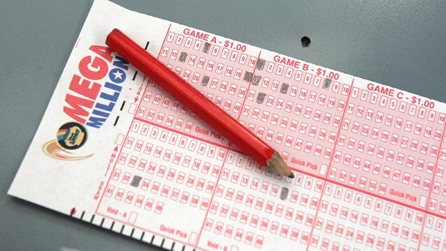 PHOTO: A Mega Millions number selection card lies on the counter at a lottery ticket kiosk at O'Hare International Airport in Chicago, Illinois, in this file photo.