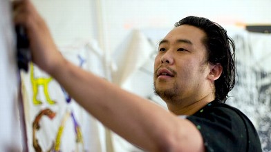PHOTO: Artist David Choe, who painted murals at the headquarters of Facebook Inc. in exchange for an undisclosed amount of company stock, works in his studio in the Chinatown section of New York, May 28, 2009.