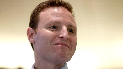 PHOTO: David Ebersman, chief financial officer of Facebook Inc., smiles during a news conference at city hall in Menlo Park, California, Feb. 8, 2011.