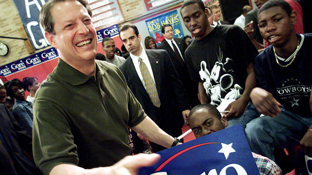 PHOTO: U.S. Vice President and Democratic presidential candidate Al Gore reaches out to shake hands following a speech to students, faculty and parents at the William Raines High School in Jacksonville, Fla. March 3, 2000.