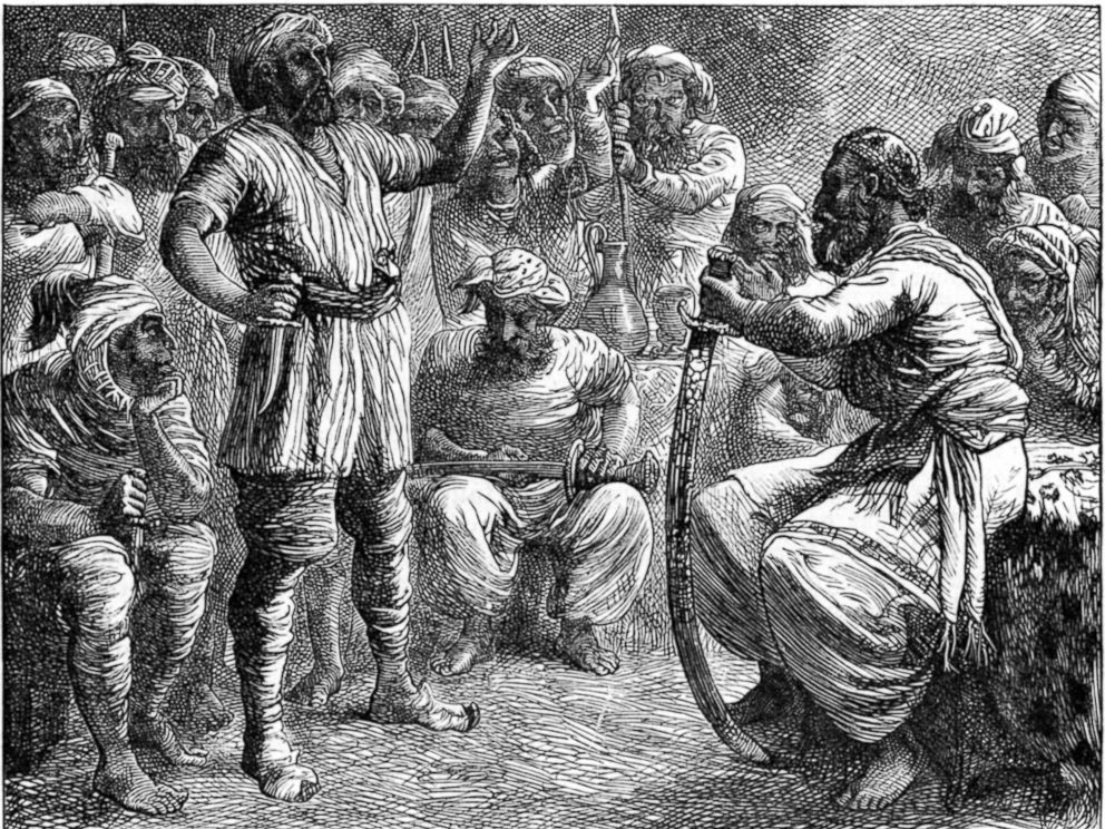 PHOTO: Illustration depicts a group of robbers in talking in a scene from the story of Ali Baba and the Forty Thieves in the Arabian Nights collection of tales from the late 1800s.