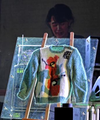 Aung San Suu Kyi Sweater Sold for $74,000
