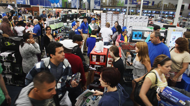 PHOTO: Shoppers move through a Best Buy store on Black Friday, Naples, Florida, Nov. 25, 2011.