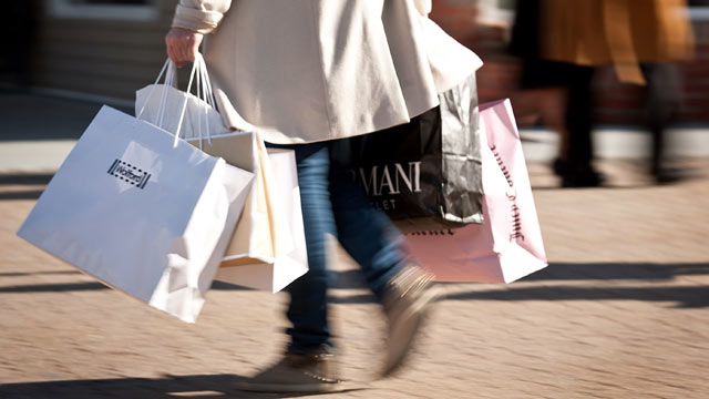 PHOTO: A shopper carries bags at the Woodbury Common Premium Outlets center in Central Valley, New York on Oct. 28, 2011.