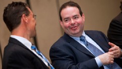PHOTO: Marc Casper, president and chief executive officer of Thermo Fisher Scientific Inc., right, speaks with Greg Herrema, the company's senior vice president, during a press conference at the Pittcon 2010 Exposition in Orlando, Florida, U.S., on March,