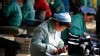 PHOTO: Chinese workers go about their chores at a textile factory in Huaibei, Anhui province in China, Feb. 10, 2012.