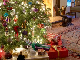 PHOTO: Christmas presents are seen under a tree.