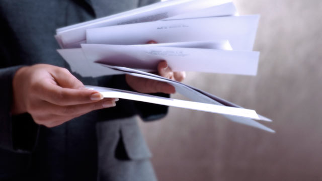 PHOTO: Over 10 million checks are going out to credit card holders as the result of the Currency Conversion Fee Antitrust Litigation settlement.