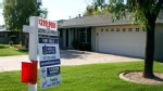 PHOTO: A Gorilla Capital realty for sale sign is displayed outside of a house in Phoenix, Arizona on Aug. 14, 2011.