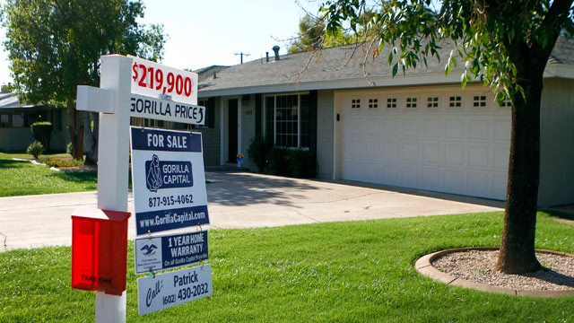 PHOTO: A Gorilla Capital realty for sale sign is displayed outside of a house in Phoenix, Arizona on Aug. 14, 2011.