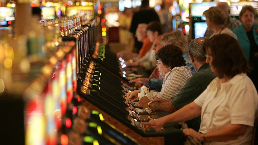 PHOTO: People playing slot machines