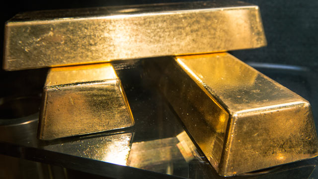 PHOTO: Three .9999 fine gold bars, 400 troy ounces or 28 lbs each, with a combined value of more than USD 2 million, are displayed at the Bureau of Engraving and Printing (BEP) on August 27, 2012, in Washington, DC.
