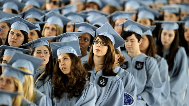 PHOTO: Graduates listen to US President Barack Obama as he delivers the Commencement Address at Barnard College's graduation ceremony in New York on May 14, 2012.