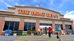 PHOTO: Customers enter and exit a Home Depot Inc. store in Atlanta, Georgia, U.S., Oct. 28, 2010.