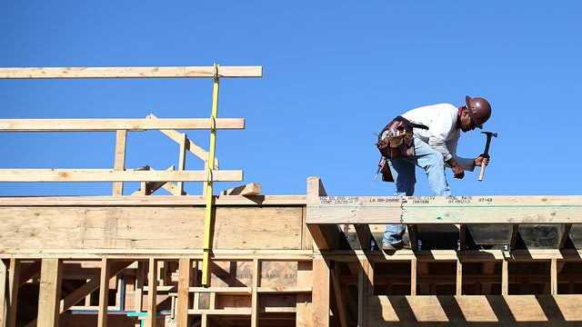 PHOTO: A construction worker uses a hammer at a new housing development, Feb. 20, 2013, in San Mateo, Calif.