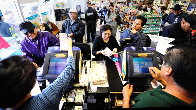 PHOTO: Customers wait in line to buy their Mega Millions tickets at Bluebird liquor store, March 29, 2012 in Hawthorne, Calif.