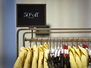PHOTO: A discount sign is displayed on a clothing rack in the Westfield Garden State Plaza mall in Paramus, New Jersey.