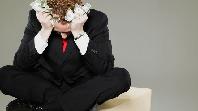 PHOTO: Money resolutions may be difficult to keep in 2013.